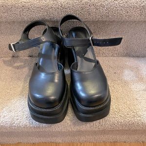 Platform heels, size 8. They were never worn.